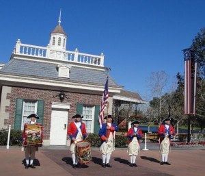 The Spirit of America Fife & Drum Corps performs outside The American Adventure in December 2011.