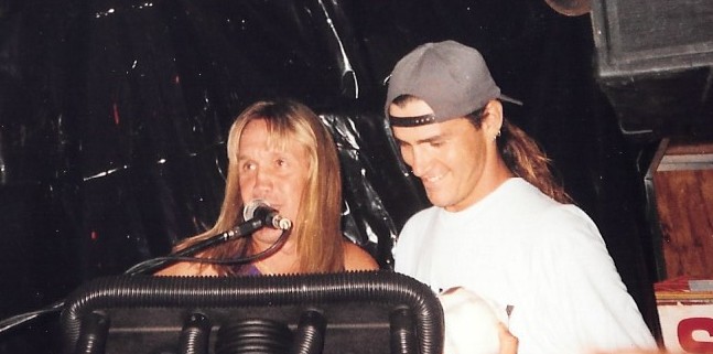Iron Maiden's Nicko McBrain presents the Drummer award to Raped Ape's J.C. Dwyer in 1993.